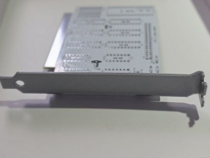 Picture of SILVER PLASTIC HIGH PROFILE BLANK BRACKET FOR ISA CARD XT-IDE XT-CF